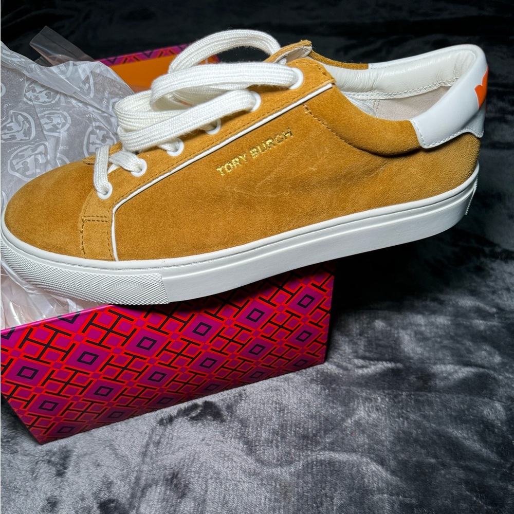 Brand new Tory Burch sneakers .